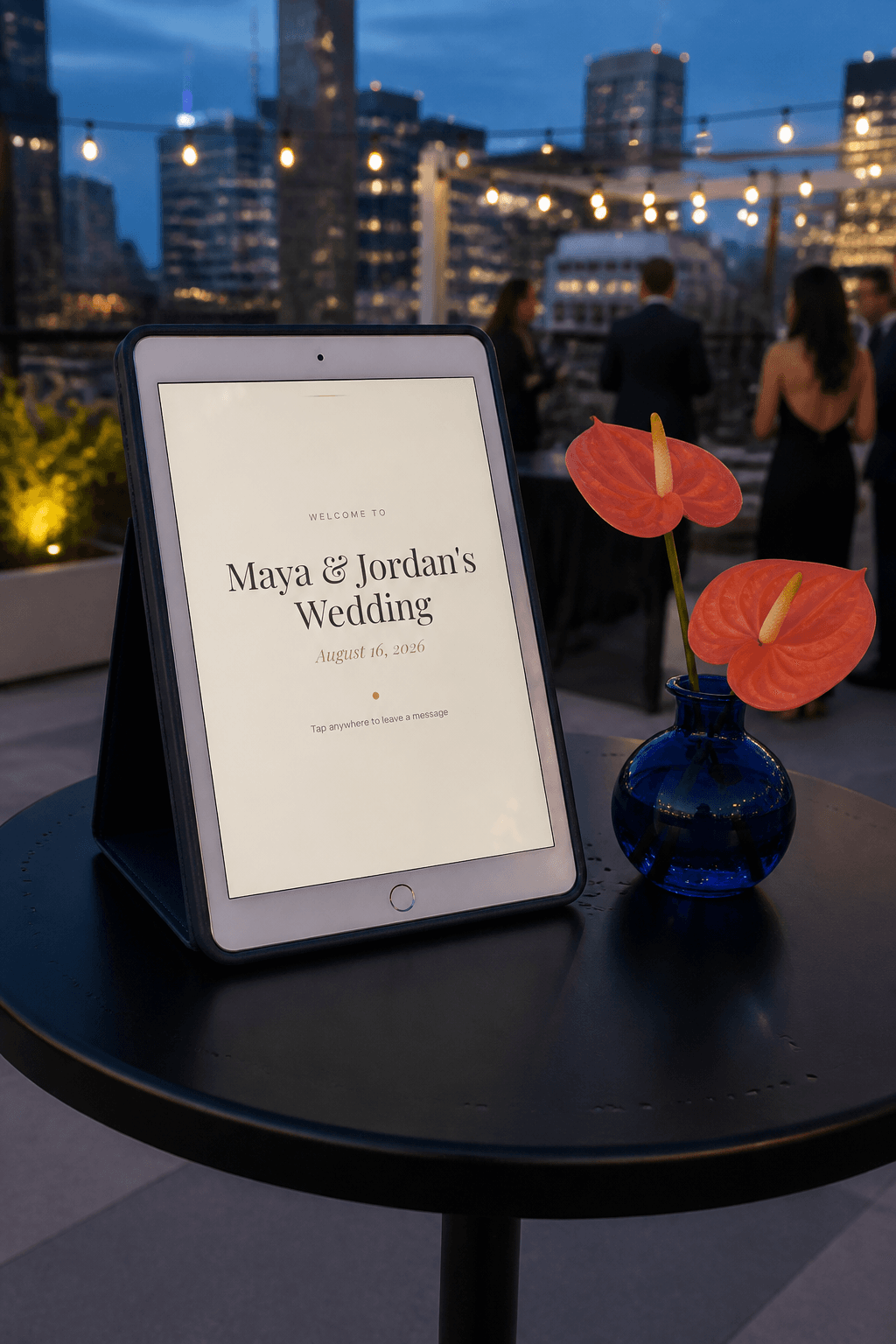 iPad video guestbook on a gold stand at a rooftop wedding